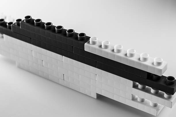 The image shows elements of a children's plastic construction set, arranged without a clear structure. The constructor for kids consists of bright plastic parts. The toy teaches how to combine and build.
