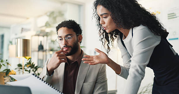 istock Teamwork, documents and business people in office, advice and feedback to edit proposal. Employees, coworking and mentor with journalist, paperwork or creative agency with help, cooperation or review 2210379562