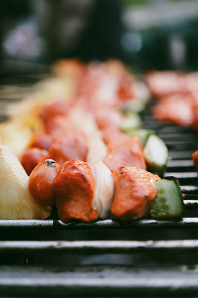 Selective focus Tasty skewers BBQ on grill at outdoor event