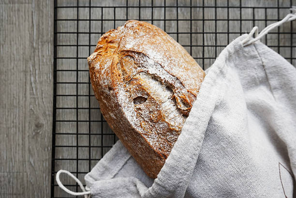 istock Freshly baked bread on a mesh tray 2210380623