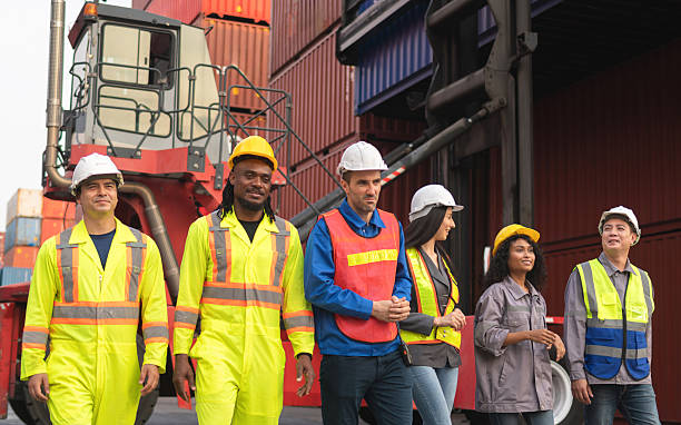 istock Success Teamwork Concept, Happy business people engineer and worker team in industry containers yard 2210381835