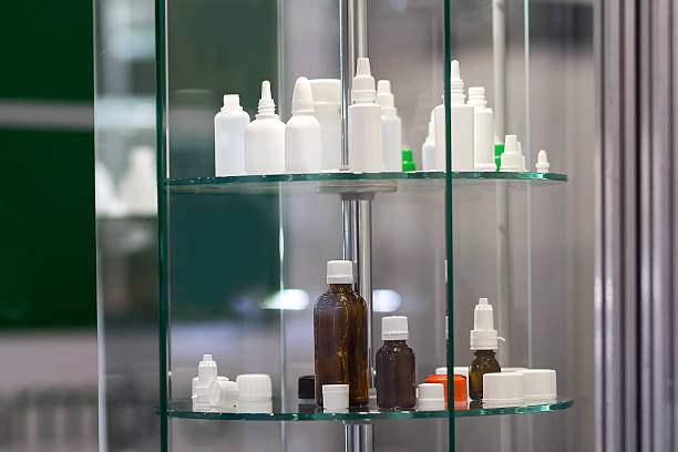 istock Various bottles for eye drops and medications on a stand 2210384231