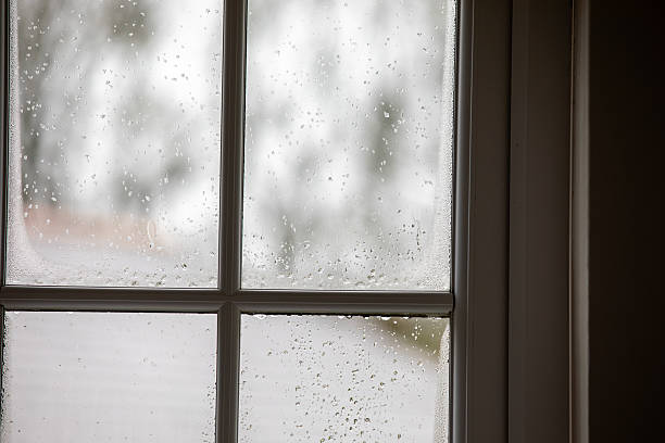 istock A window showing the rainy day outside. 2210388845