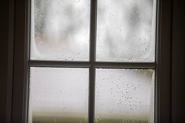 istock A window showing the rainy day outside. 2210388847