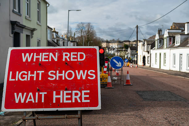 istock Traffic control warning sign in a street 2210393969