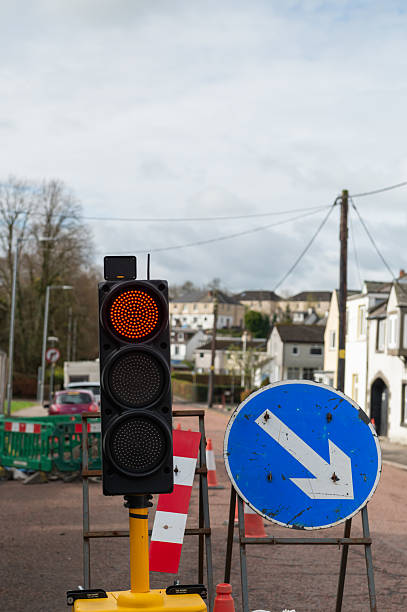 istock Traffic lights at road works 2210393981