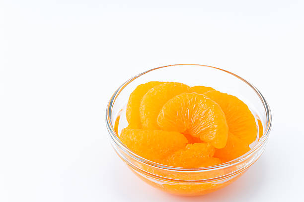 istock Canned mandarin oranges in a glass bowl 2210398346