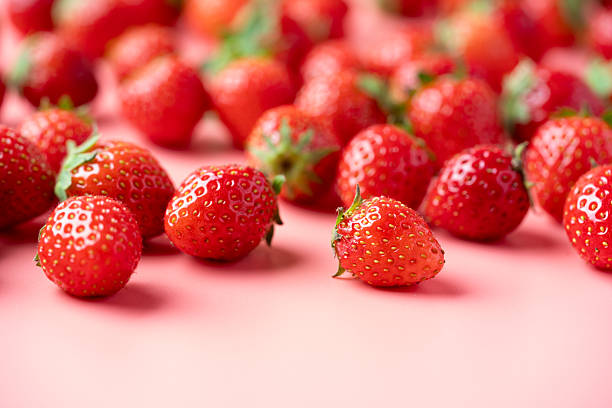 istock Close-up background of cute strawberries 2210399906