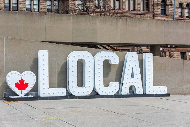 Toronto Ontario, Canada- April 14th, 2025: A heart local Canada sign at Toronto City Hall’s Nathan Phillips Square.