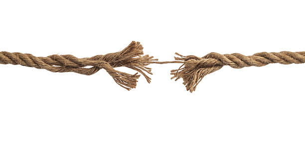istock A frayed rope under pressure about to break on white background 2210402954