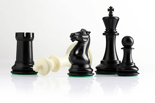 istock chess pieces on chessboard on marble background. game of chess 2210408480