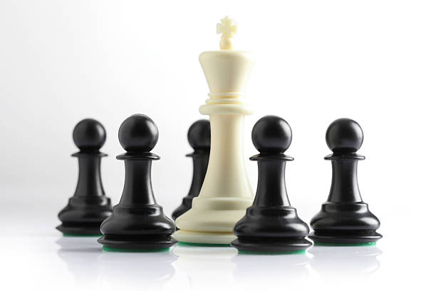 istock chess pieces on chessboard on marble background. game of chess 2210408645