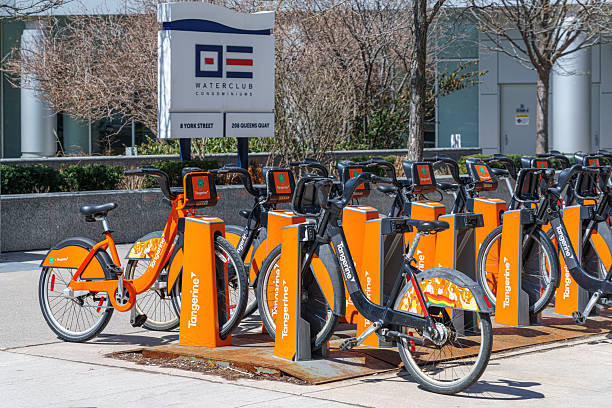 Toronto, Canada - April 13, 2025: Station of the Bike Share System in the waterfront district, a famous place in the city.