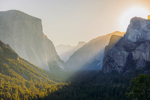 Dramatic view of idyllic summer landscape of Yosemite National park during bright summer sunrise viewed from Tunnel View, California, the United States