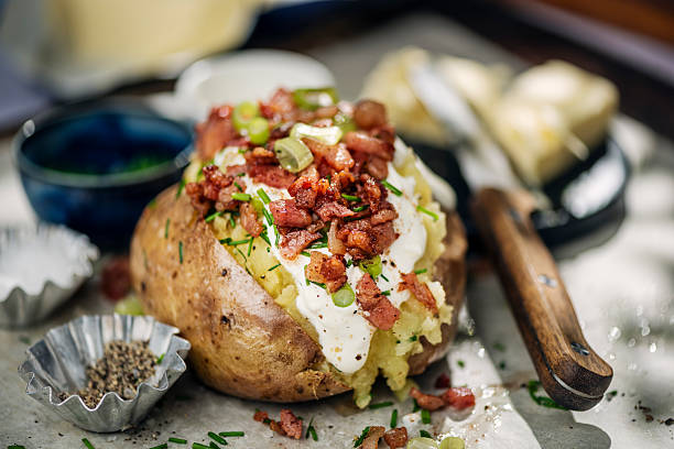 istock Jacket Potato with Crispy Bacon and Sour Cream 2210411133