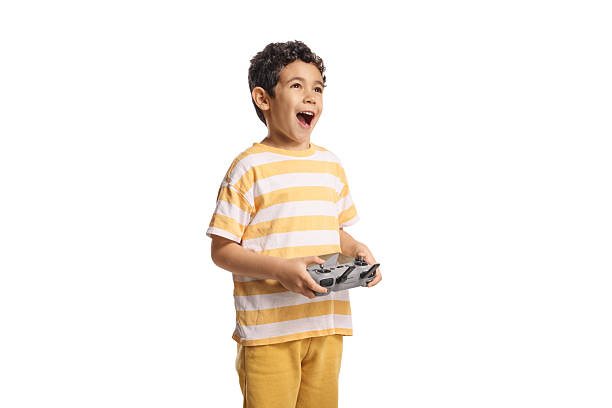 Happy asian kid holding a drone remote control