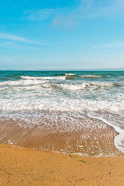 istock Background sea beach with waves and foam. 2210412798