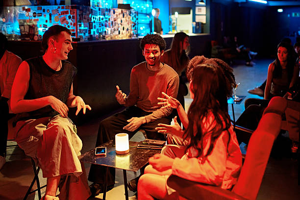 Friends relaxing after work at nightclub