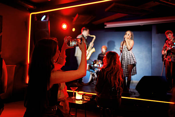 istock Jazz musicians performing onstage at nightclub 2210416063