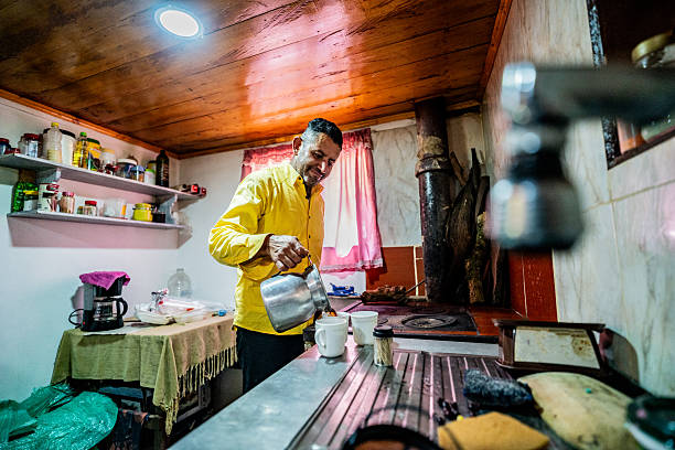 istock Mature man preparing coffee in a farmhouse 2210417323
