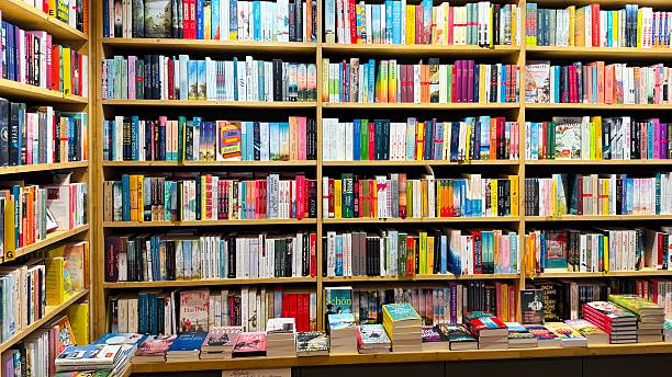 istock Library with fully packed colorful shelves 2210421667