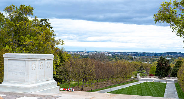 The Tomb of the Unknown Soldier located at Arlington National Cemetery in Arlington, VA, just outside of Washington, DC.  Originally this is the burial site of a World War I soldier whose remains were unidentifiable, but is now the site for unknowns from World War II and the Korean War.  The Tomb is guarded 24/7, 365 days a year by an Honor Guard.  Every thirty minutes there is a changing of the Honor Guard ceremony.