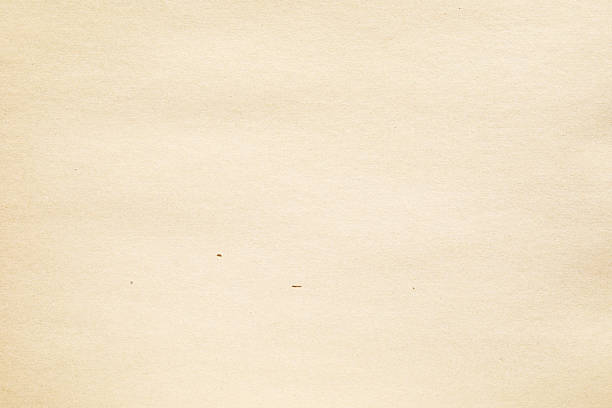 istock Brown Grain paper texture macro closeup with stains 2210428815