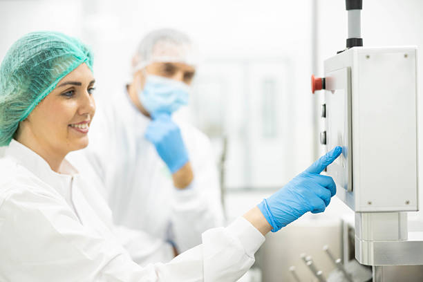 istock Activating Machinery in Cleanroom Setup 2210430511