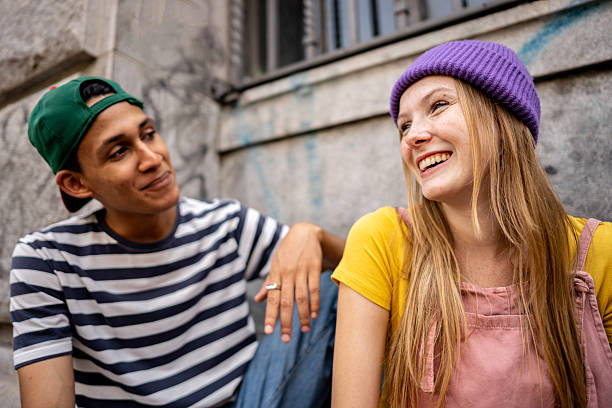 istock Young friends talking outdoors 2210434323