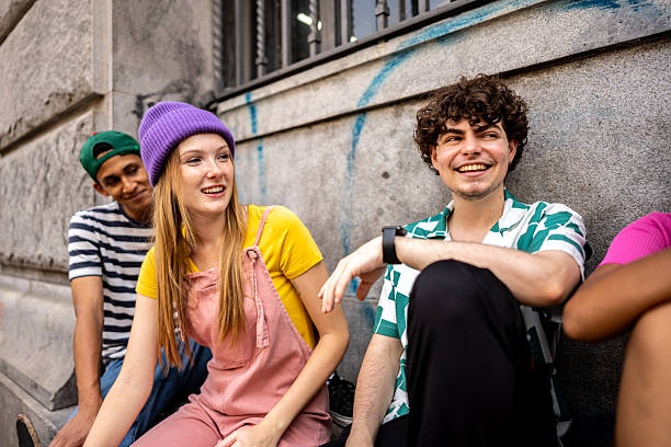 istock Young friends talking outdoors 2210434327