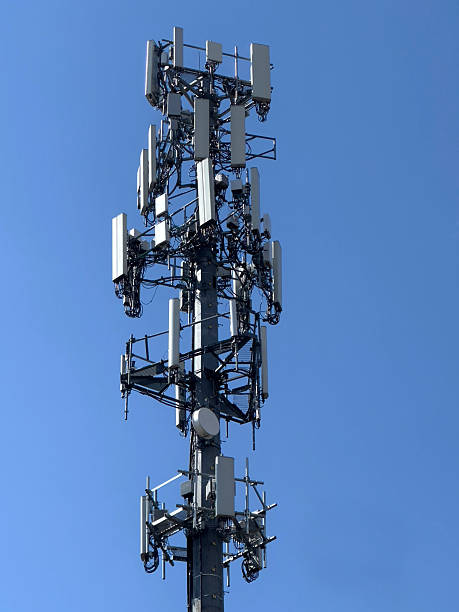 istock Cell Tower against a clear blue sky 2210436861