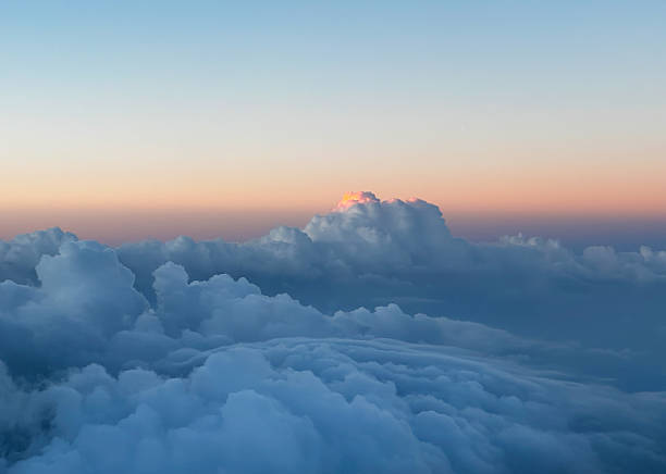 istock Beautiful view from the plane of low clouds 2210440400