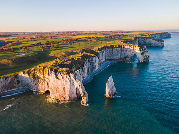 istock Cliffs and Waters of Etretat 2210440900