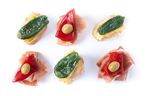 istock Traditional Spanish pintxos isolted on white background 2210445402