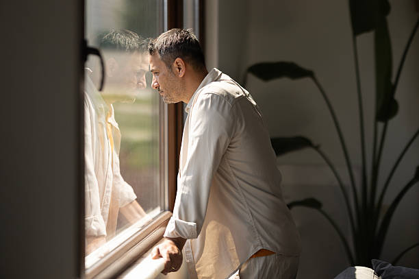 istock Pensive lost in thoughts suffering from depression 2210445786