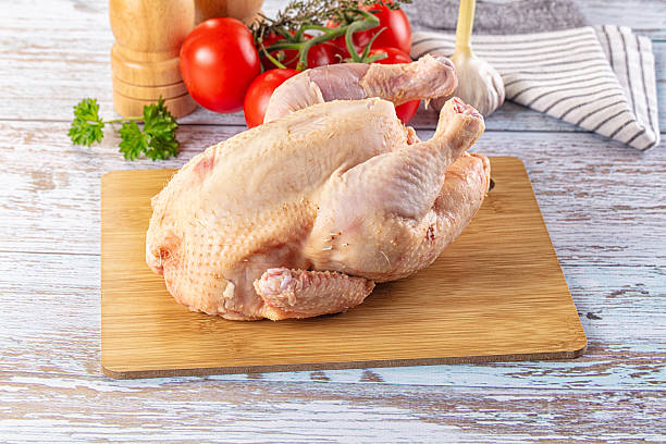 istock Raw whole uncooked organic chicken 2210449668