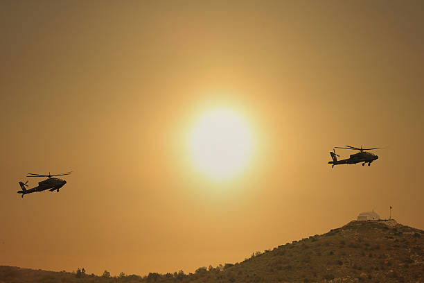 istock ah64 helicopters in formation 2210450866