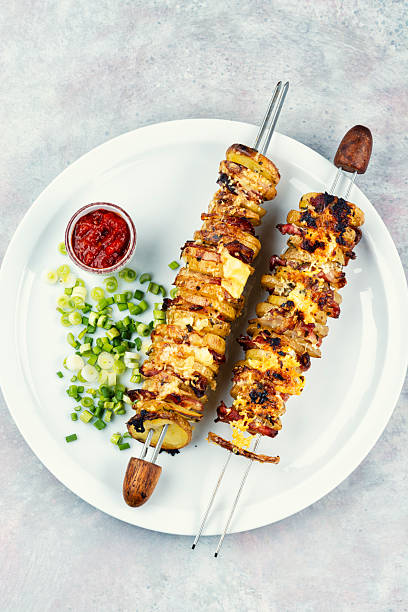 istock Delicious skewers with potatoes. 2210459997