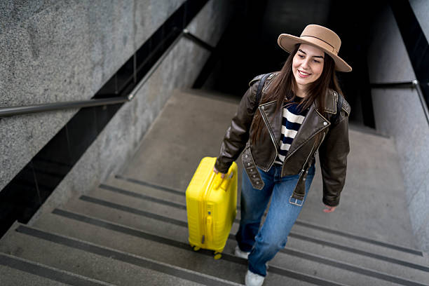 istock Subway station and a beautiful woman 2210467831