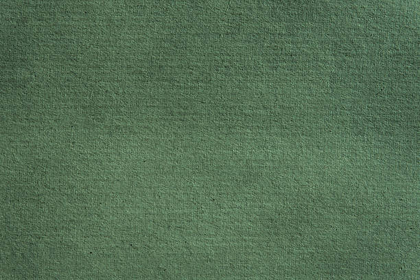 istock Recycled green grunge cardboard for creative eco projects. 2210472920