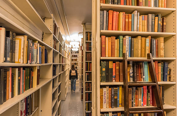 Providence, Rhode Island, USA - March 29, 2025: Interior view of the beautiful and welcoming Providence Athenaeum Library, with its bookshelves filled with valuable historical information, near Brown University. This library was founded in 1836.