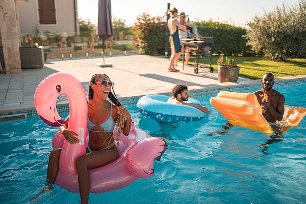 istock Floats and Friends at the Luxury Villa Pool 2210483579
