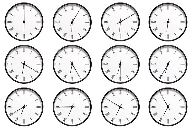 istock A set of 12 wall clocks with black frames and Roman numerals, each displaying a different time from 06:00 to 06:55 or 18:00 to 18:55. ideal for timekeeping, schedule management, and daily routines. 2210485829