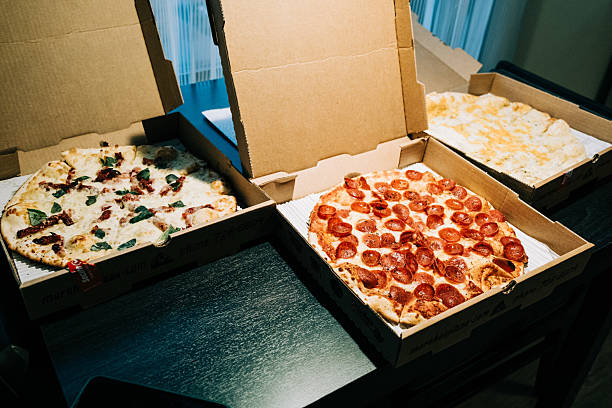 istock Delicious pizza selection featuring pepperoni and white sauce 2210487763