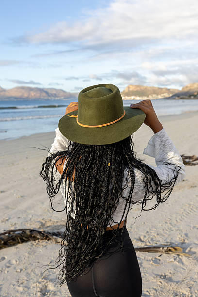 istock Green hat on the beach for sunrise 2210487817