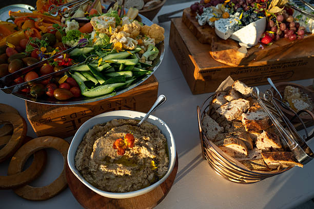 istock Colorful Coastal Wedding Appetizer Table with Hummus and Veggies 2210488896