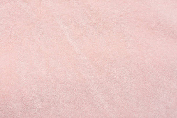 istock Texture of pink velvet fabric 2210489399