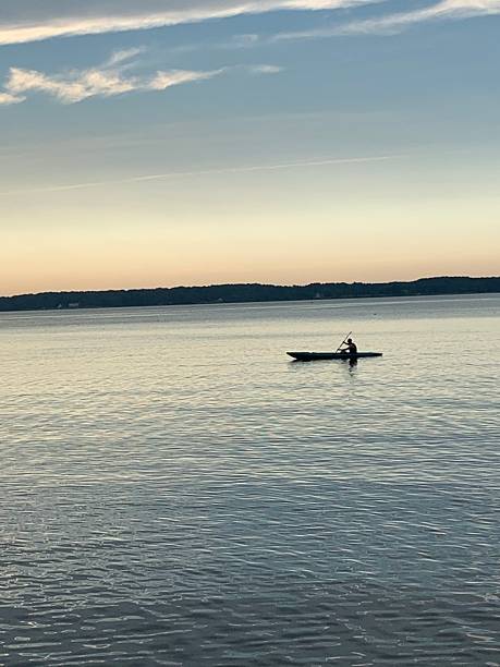 istock Person kayaking on the Chesapeake Bay at dusk 2210491504