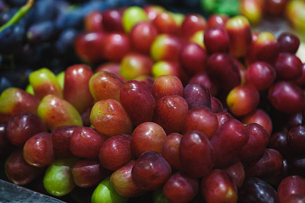 Colorful fresh grapes selling at market