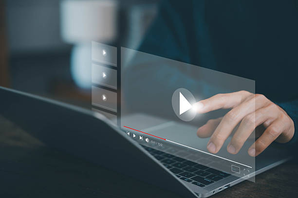 istock OTT Multimedia Watching live video streaming on your laptop computer 2210497867
